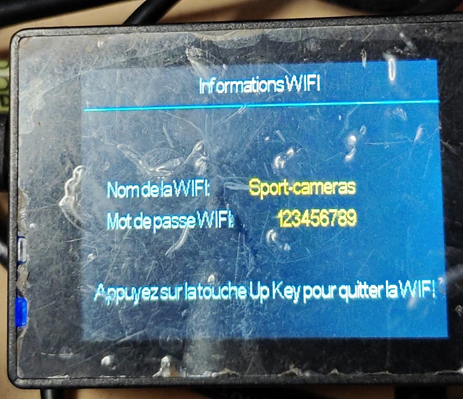 The AT-03 screen showing Informations WIFI: network name Sport-cameras, password 123456789